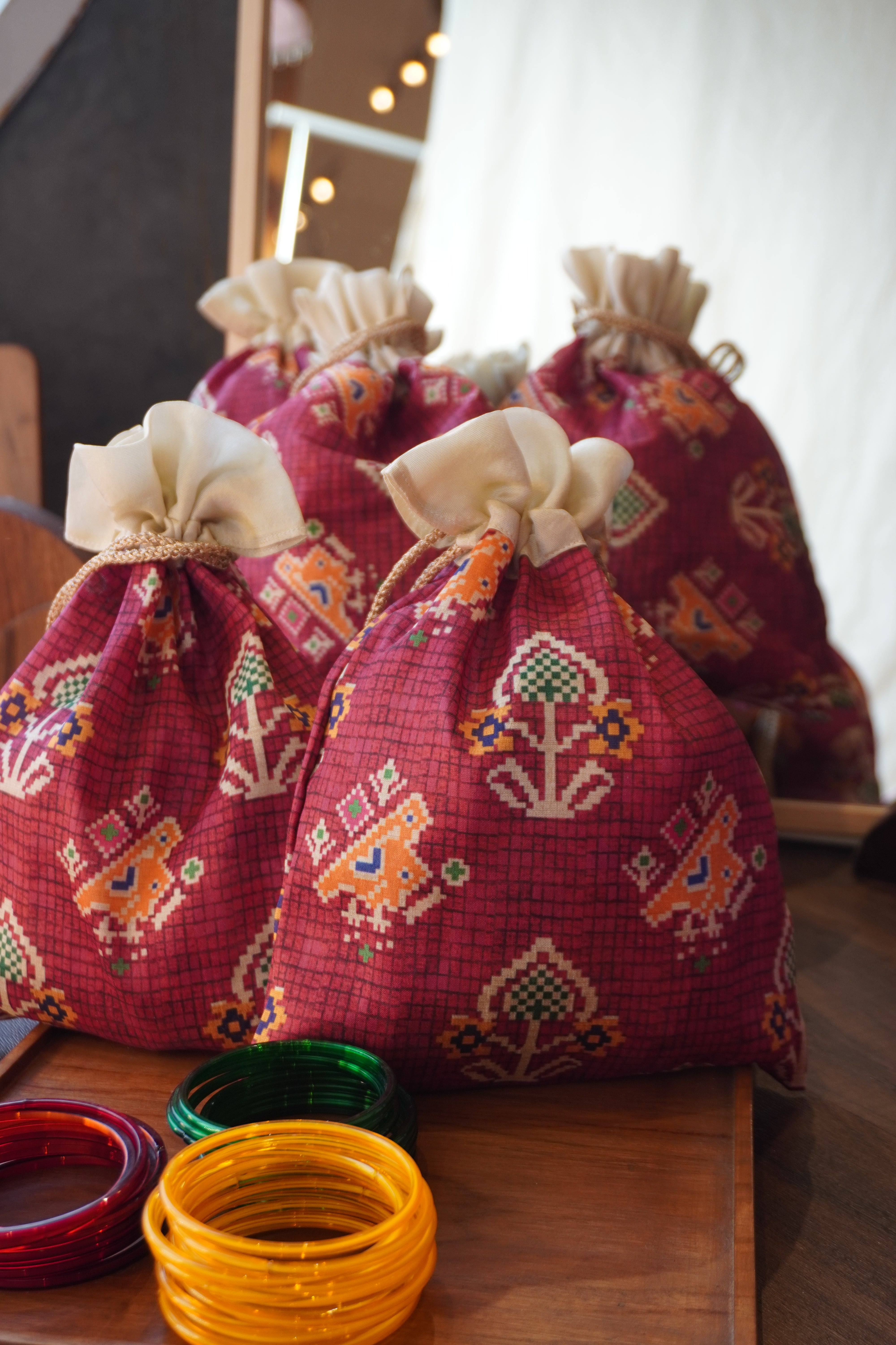 Patola print pouch potli bags - Set of 10