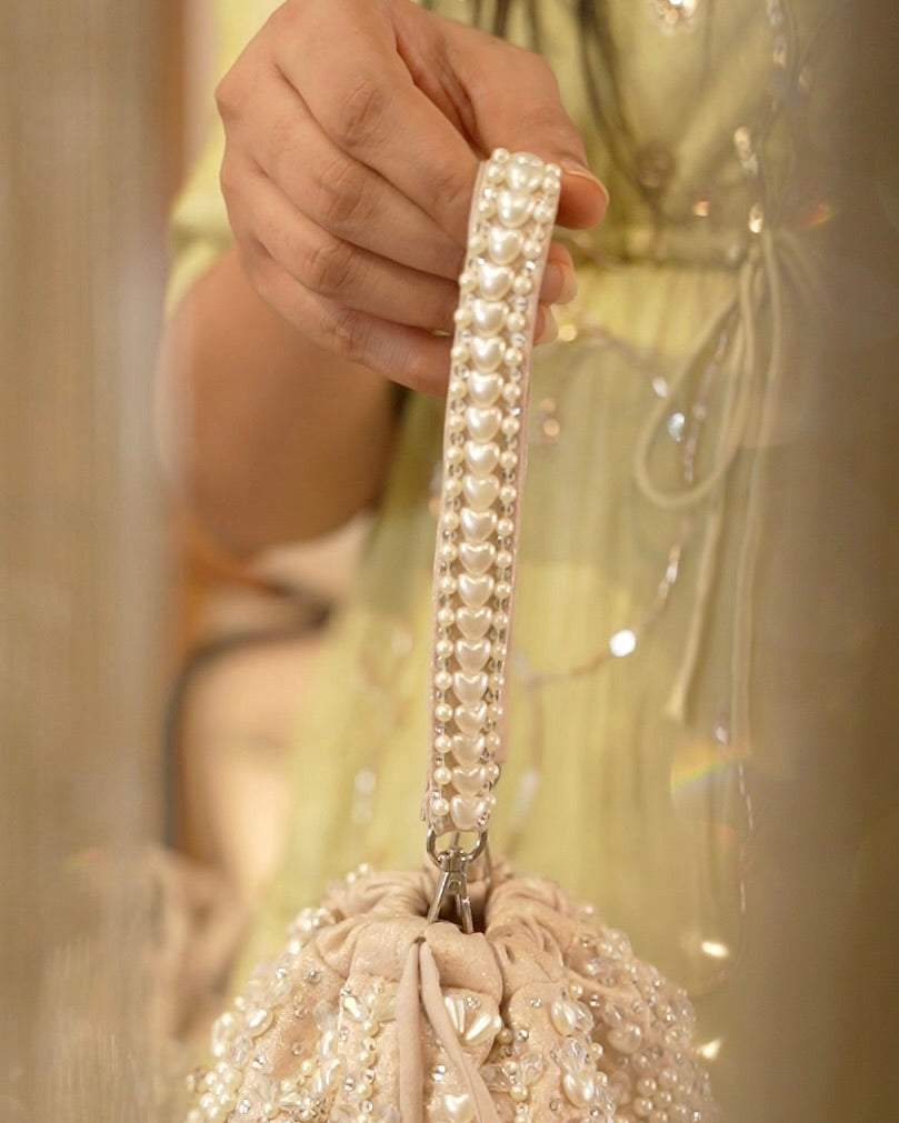 Giva Pearl and crystal lines bucket bag