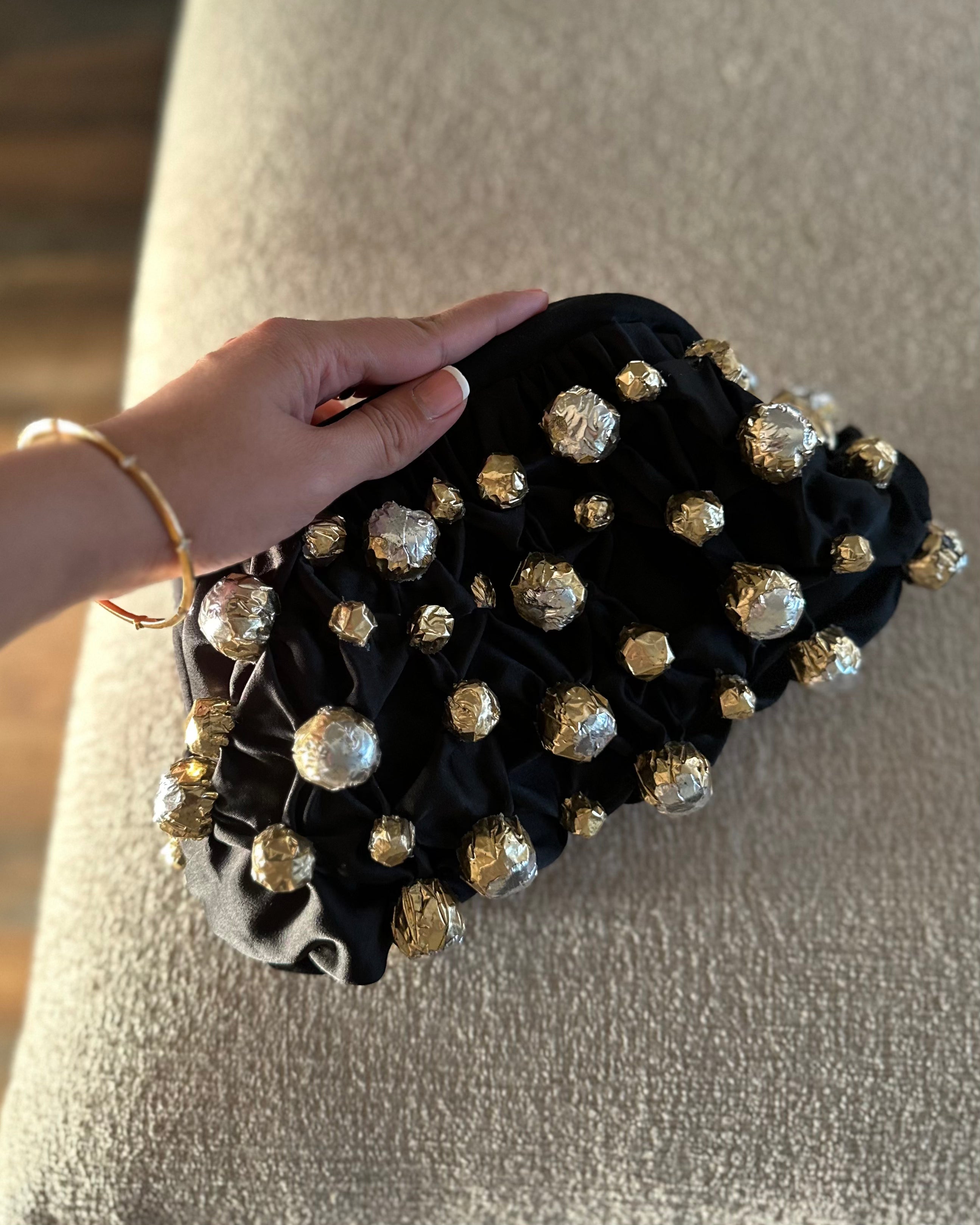 Silver and gold foil black clutch