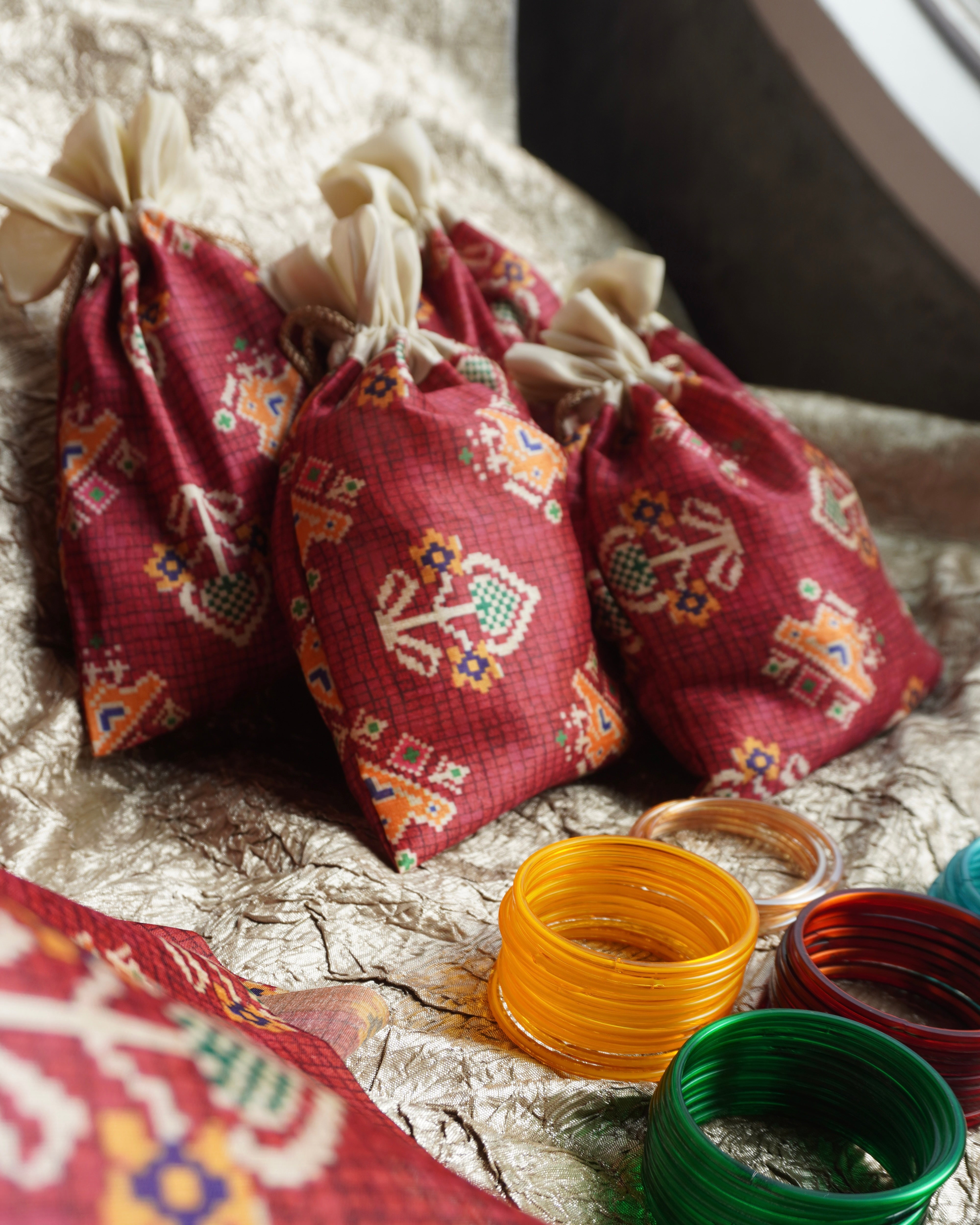 Patola print pouch potli bags - Set of 10