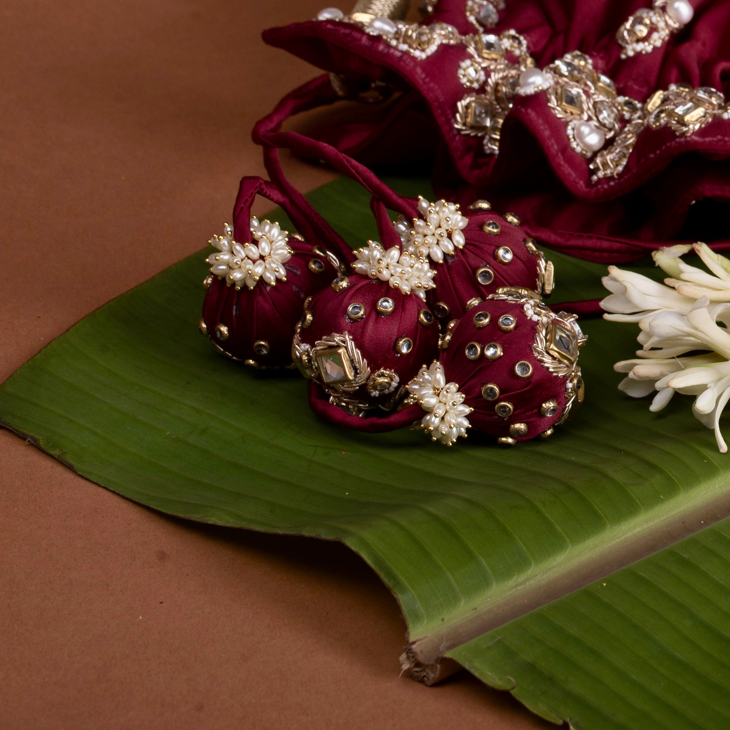 Jadau Gold Embroidered Potli- Maroon Bag