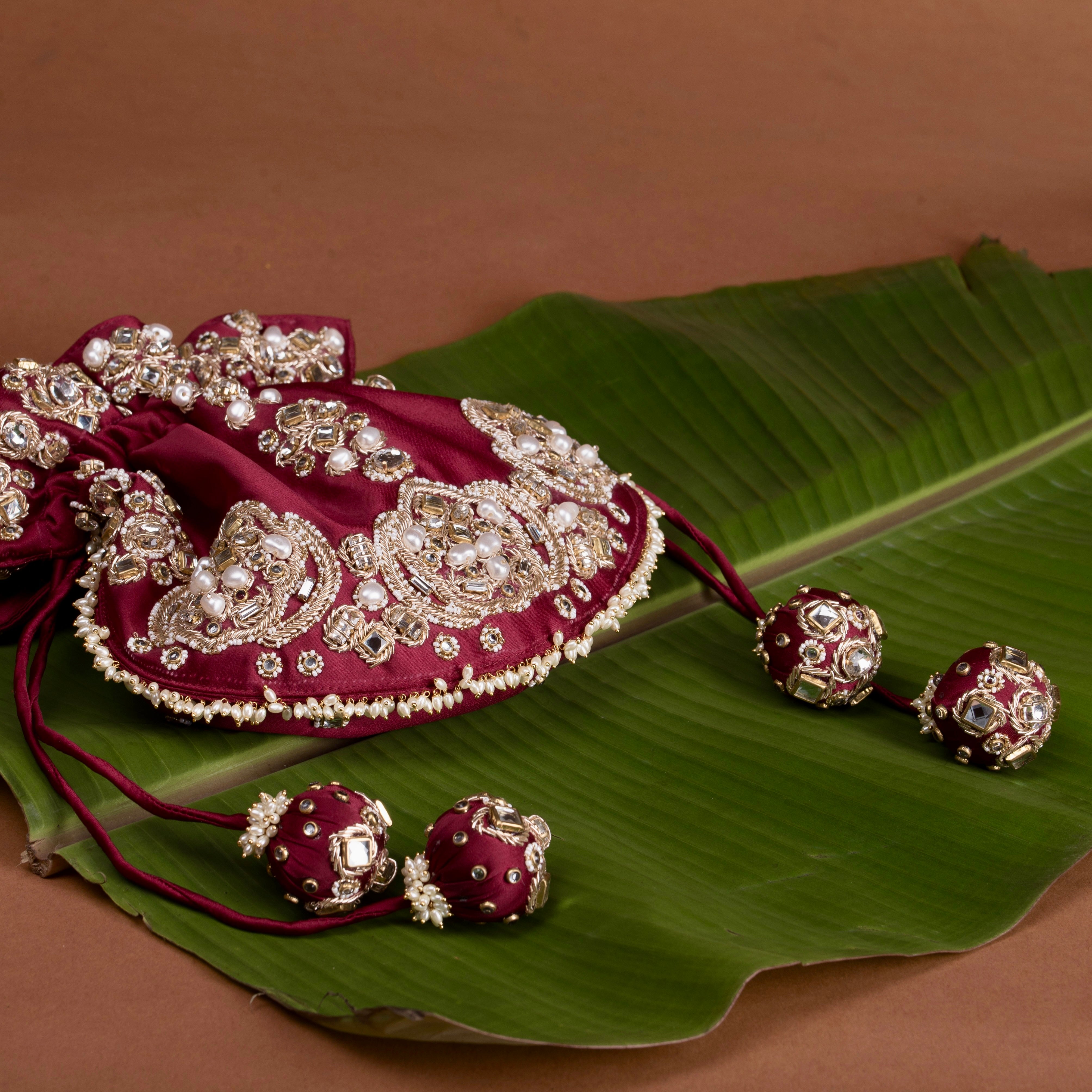 Jadau Gold Embroidered Potli- Maroon Bag